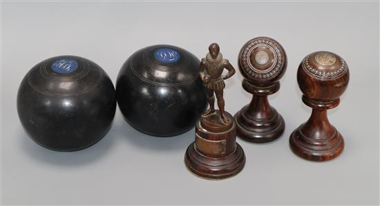 Three early 20th century bowls, trophies and two bowling balls